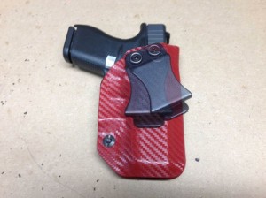 owb holster with adjustable clip
