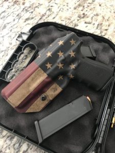 holster with adjustable belt clip