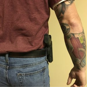 owb holster with adjustable clip